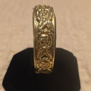 Elegant Gold Floral Bangle